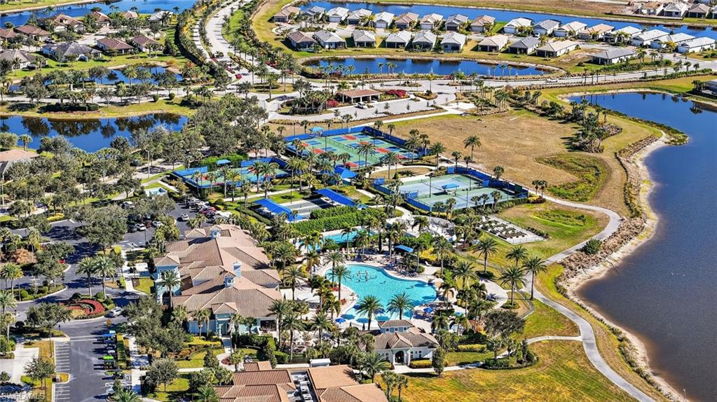Aerial overview of property's location featuring nearby suburban area and a large body of water