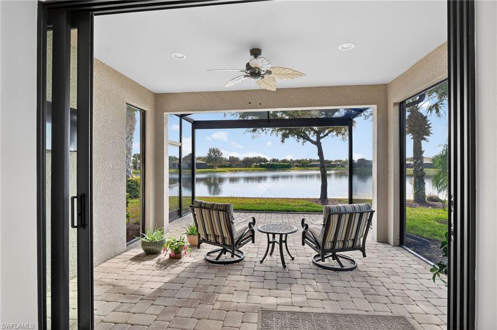 Sunroom with a water view