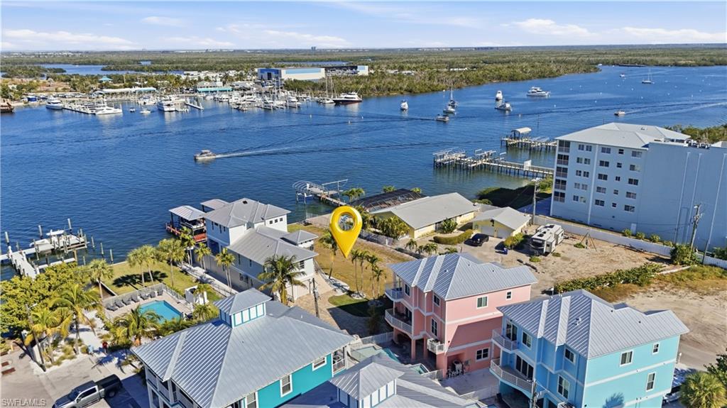 Drone / aerial view of a marina and a large body of water - Virtually Edited Image