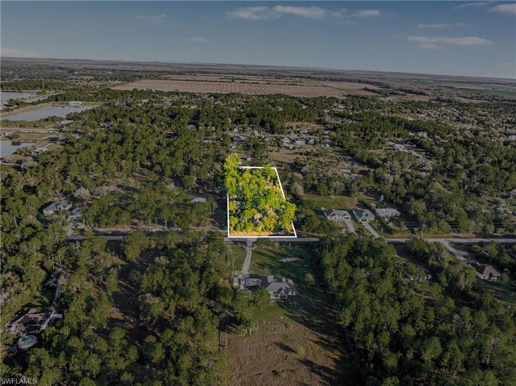 Aerial overview of property's location featuring property parcel outlined