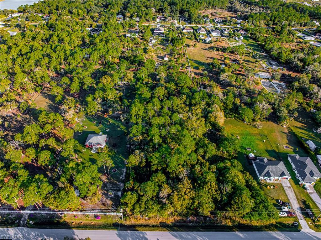 View of property location with nearby suburban area