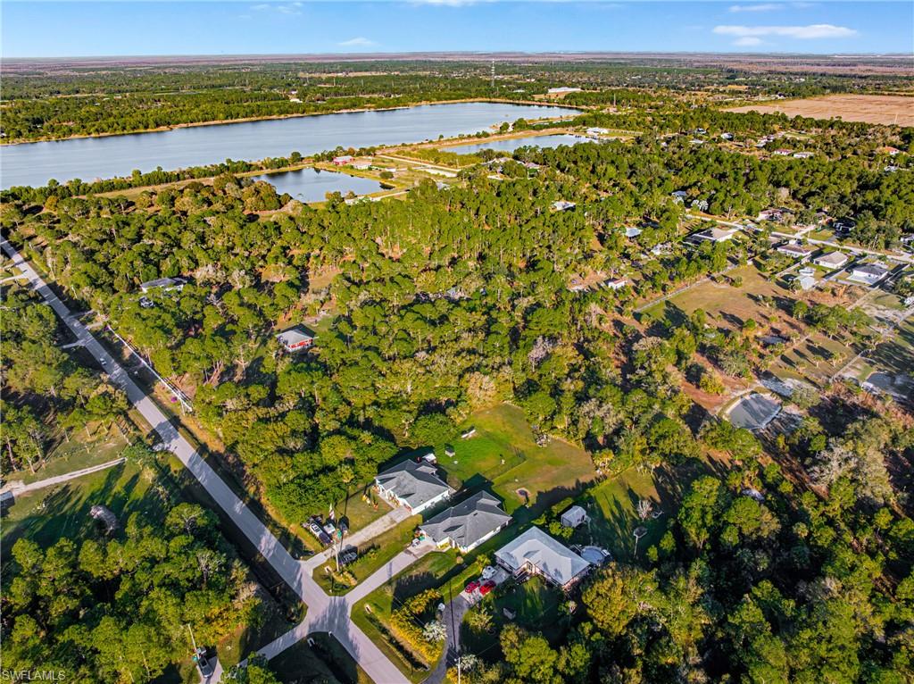 Aerial overview of property's location featuring a nearby body of water
