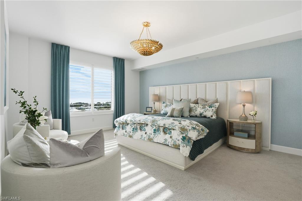 Bedroom featuring carpet flooring and baseboards - Virtually Edited Image