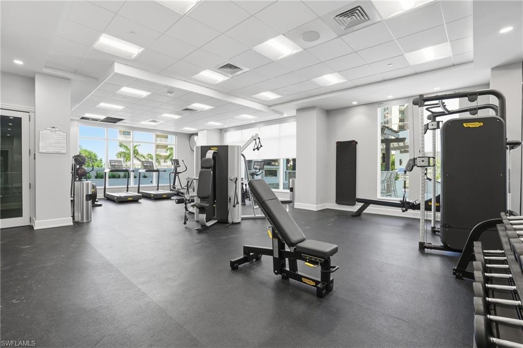 Exercise room featuring a paneled ceiling - Virtually Edited Image