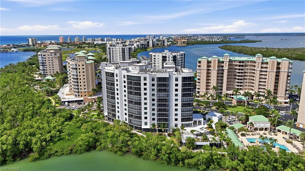 View of urban area featuring a large body of water - Virtually Edited Image