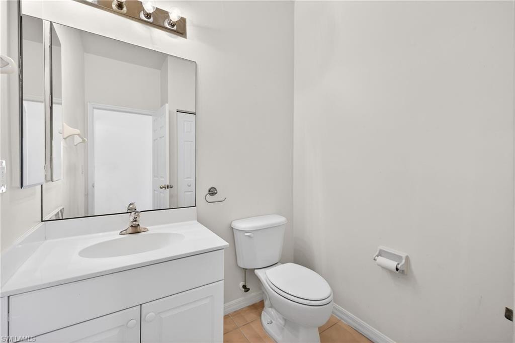 Bathroom featuring vanity and light tile patterned floors