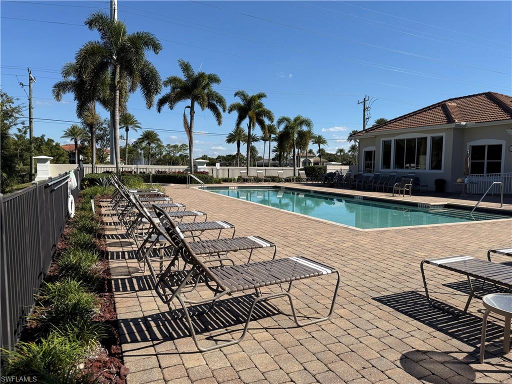 Community pool with a patio area