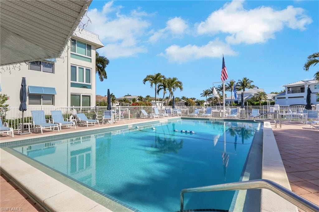 Community pool featuring a patio area
