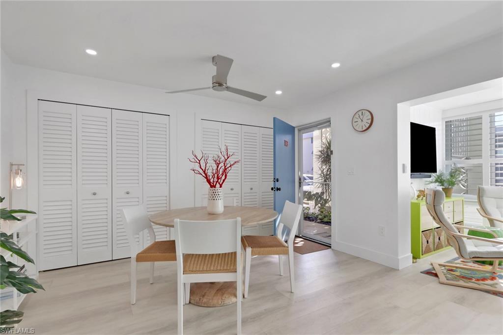 Dining space featuring ceiling fan, light wood finished floors, and recessed lighting