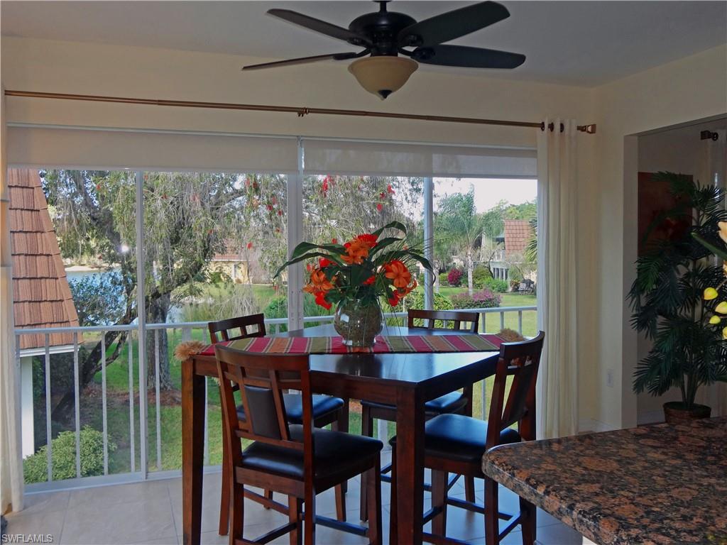 Tiled dining area with ceiling fan