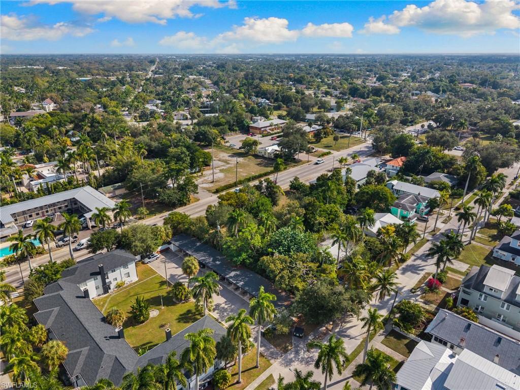 Aerial overview of property's location with nearby suburban area