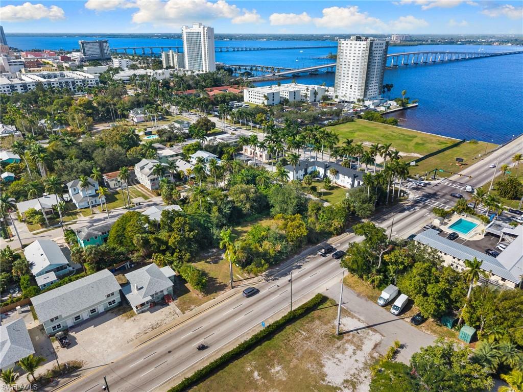 View of urban area featuring a notable bridge and a large body of water