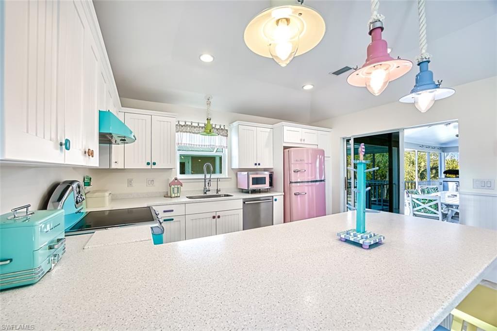 Dining space with lofted ceiling