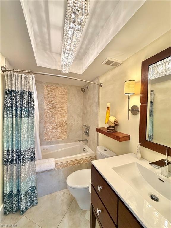 Spacious room featuring a wood-blade ceiling fan, light-colored tile flooring, and a sliding pocket door