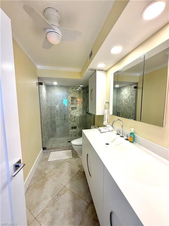 Walk-in closet with built-in shelving, wire racks, and tile flooring and wall safe