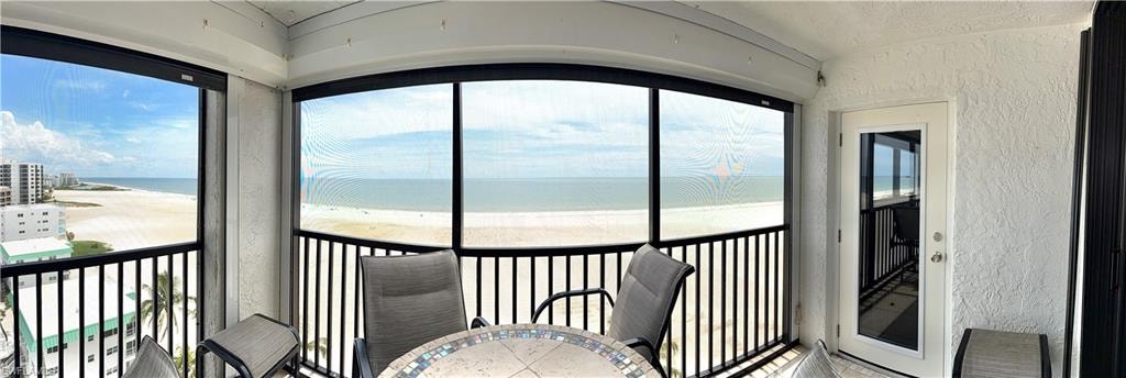 Panoramic- Primary bedroom door access, 1oth floor view, electric shutters