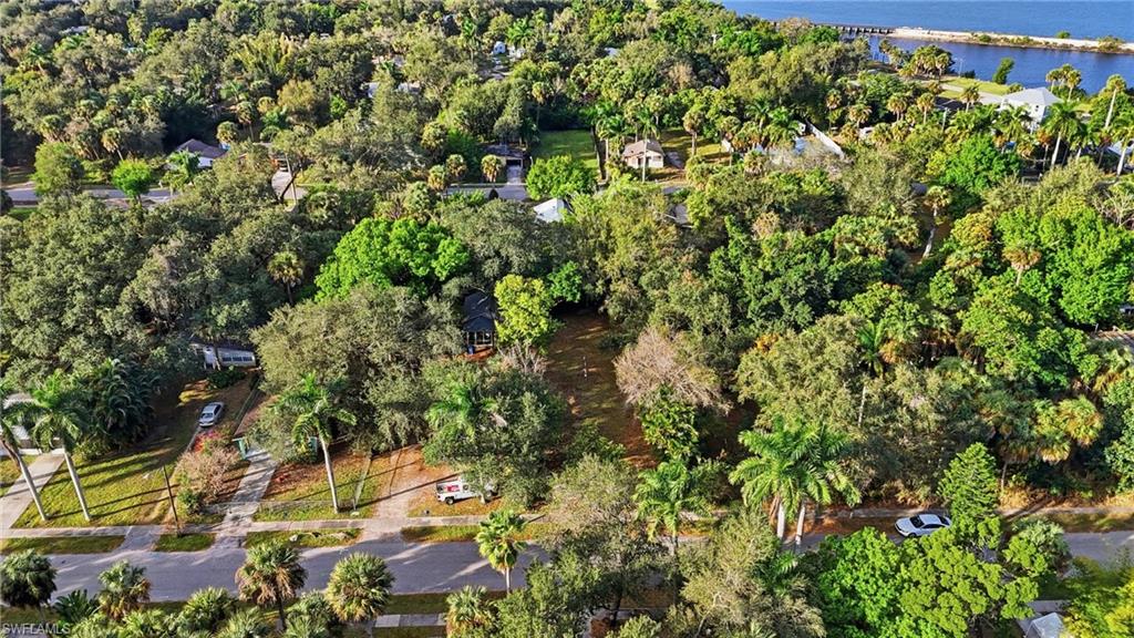 Aerial overview of property's location featuring a large body of water
