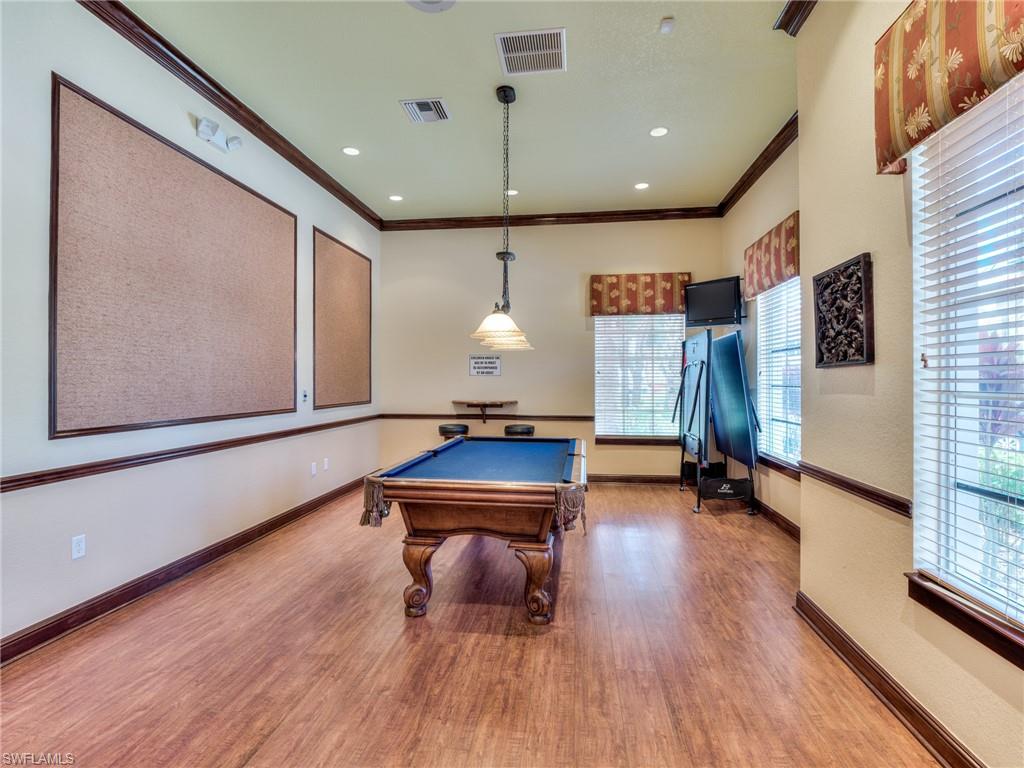 Recreation room featuring ornamental molding, pool table, and recessed lighting
