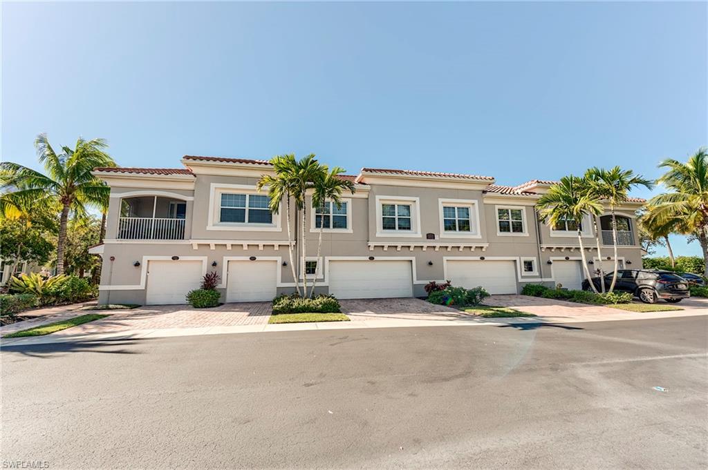 Mediterranean / spanish-style home featuring stucco siding, a tile roof, and a balcony