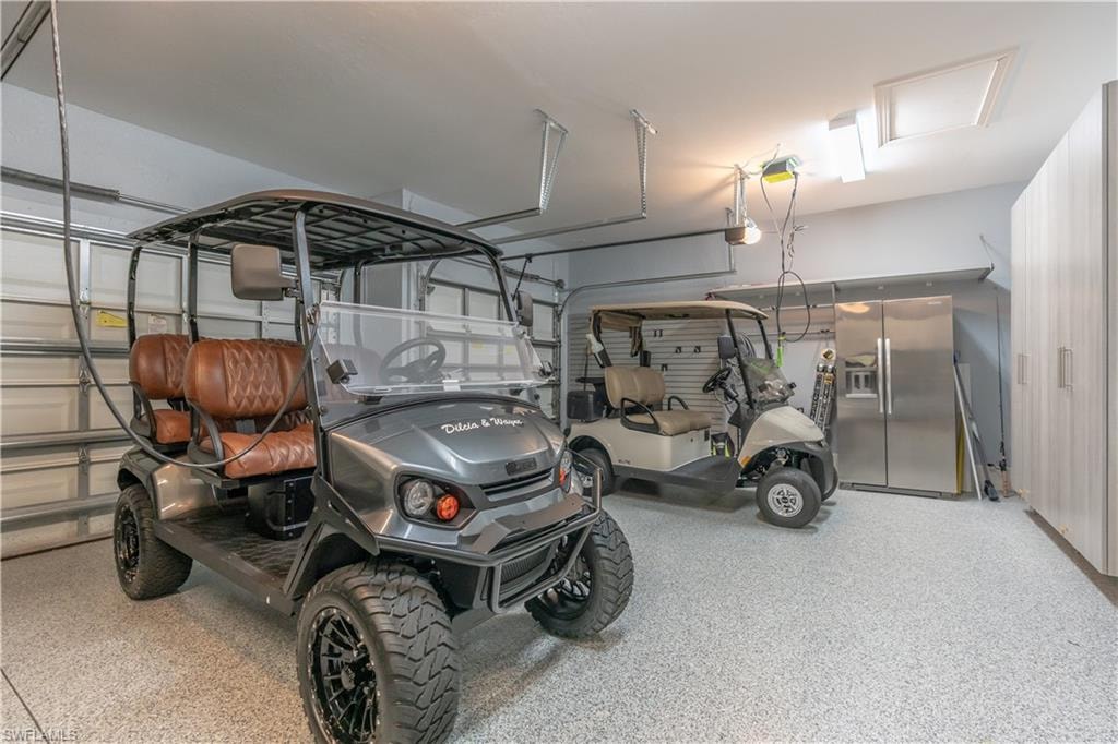 Garage with stainless steel fridge
