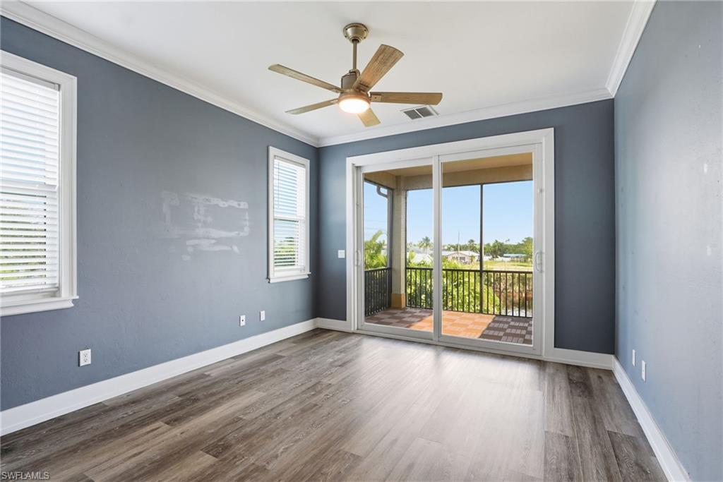 This room is a clean slate to make it the ultimate Florida bedroom or make it an upstairs work space!