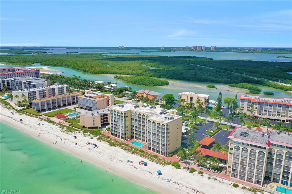 View of urban area with waterfront with a beach