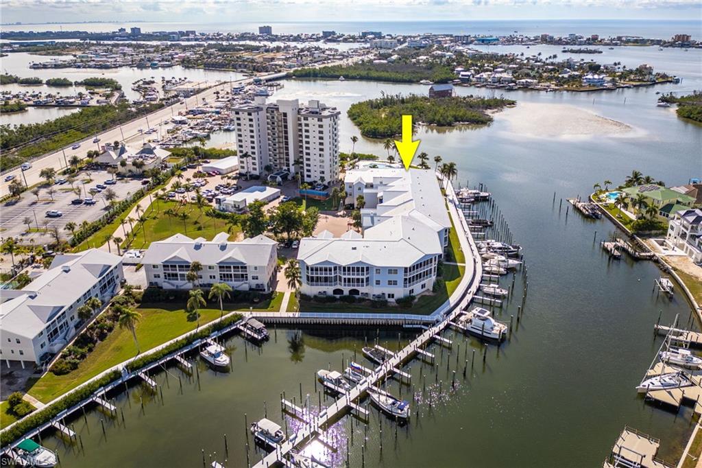 Bird's eye view of a marina and a nearby body of water