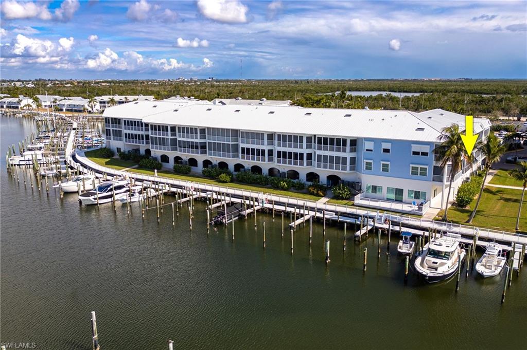 Bird's eye view of a nearby body of water and a marina