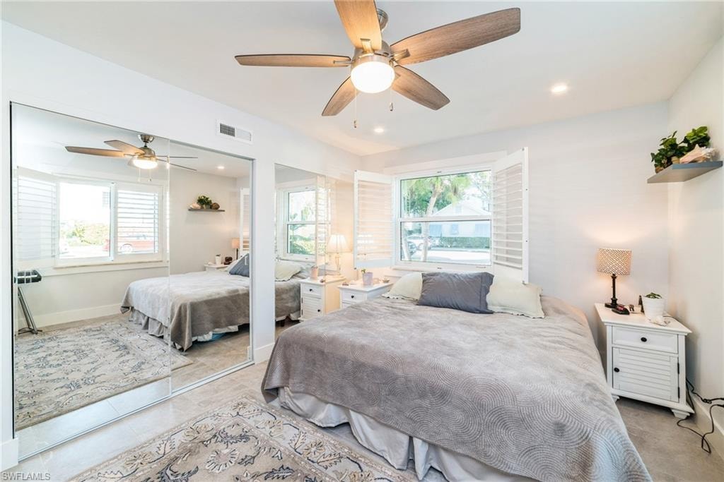 Bedroom with a closet and a ceiling fan
