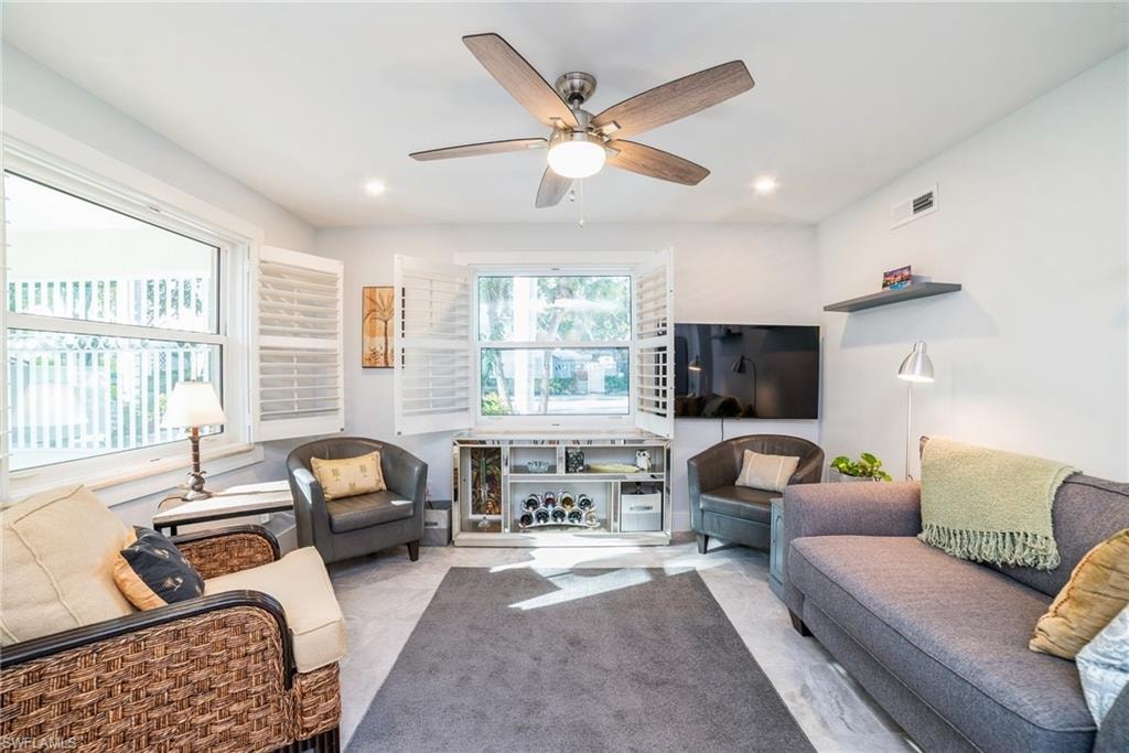 Living area featuring ceiling fan