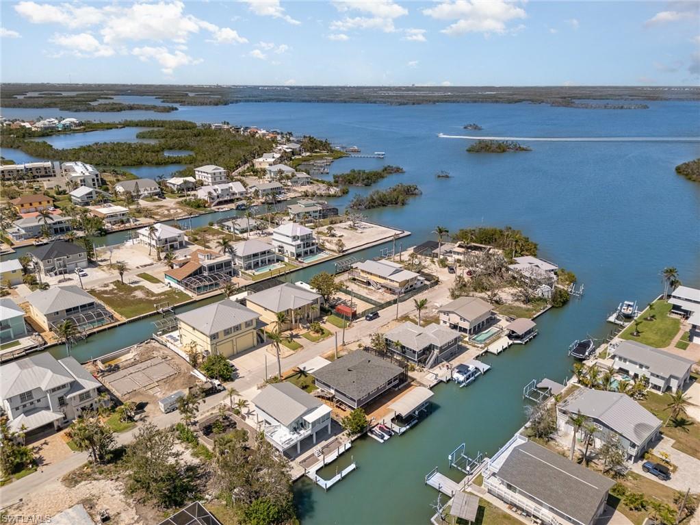 Aerial view of residential area with a nearby body of water