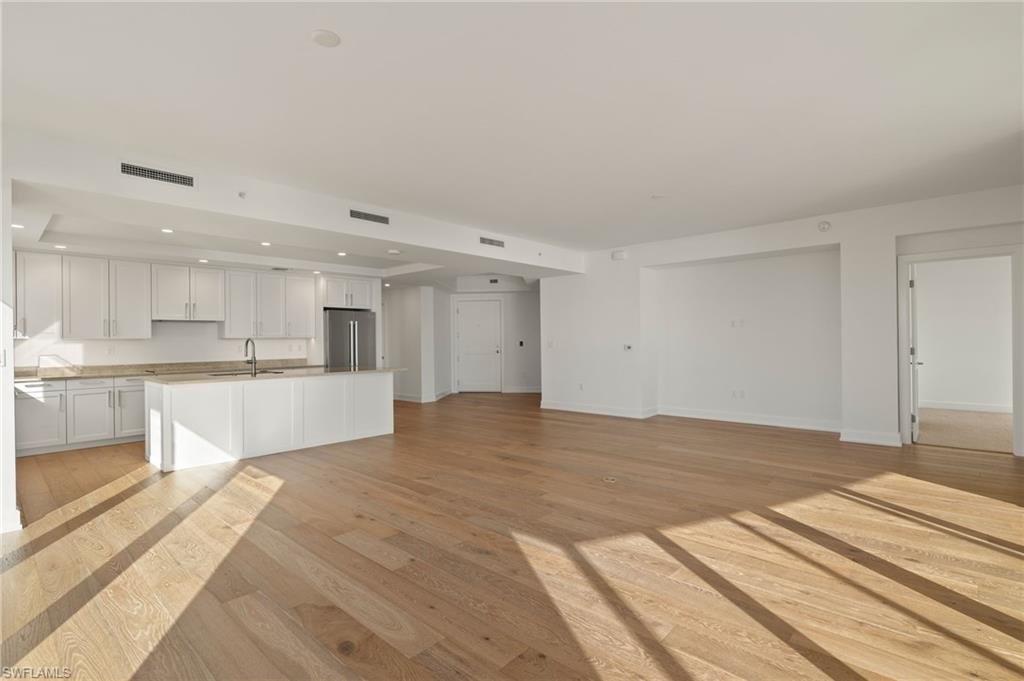 Bright and airy great room flows into dining and living room great space  for family gatherings and entertaining