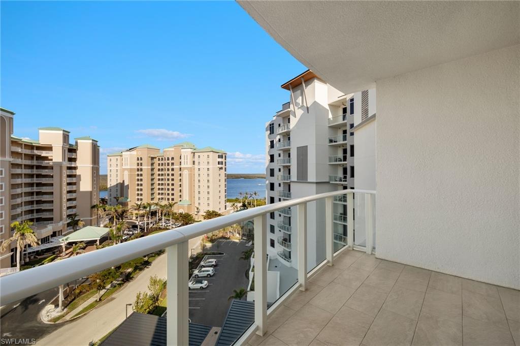 Open balcony featuring a view of bay