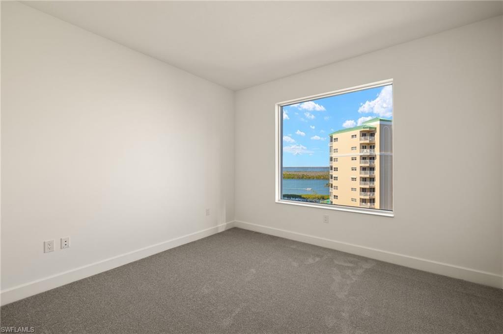 Bedroom 3 , plush carpeting , large closet and beautiful water views