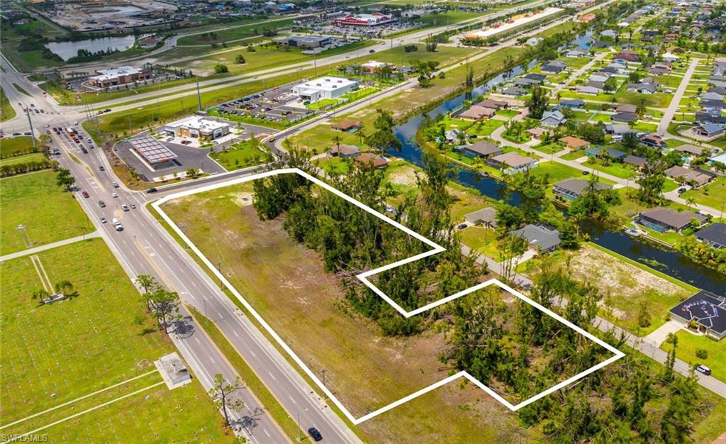 Traffic from new Daybreak Market & Gas, US Post Office and more must go by this property, as businesses fronting Pine Island must enter from behind on the road that goes by this site.