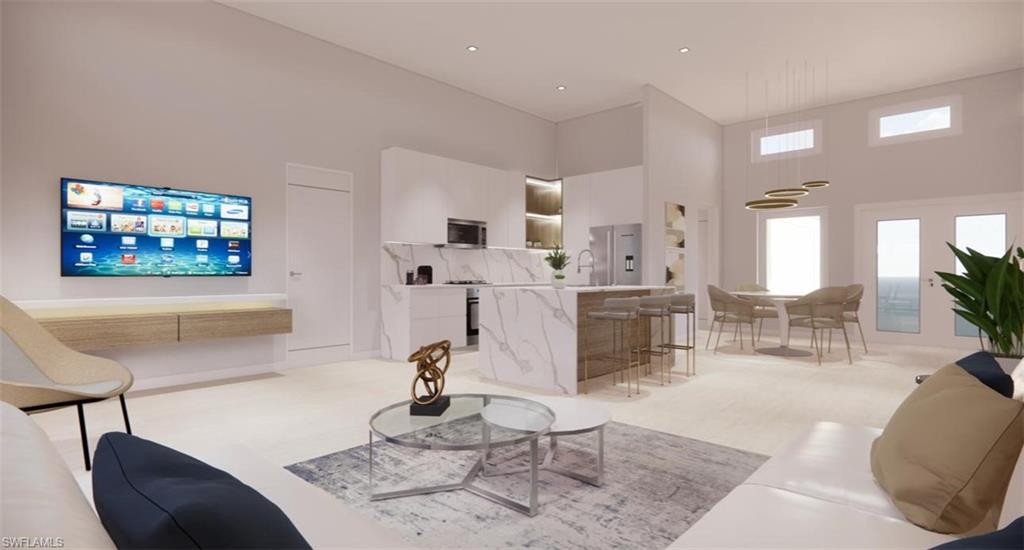 Living area with a towering ceiling