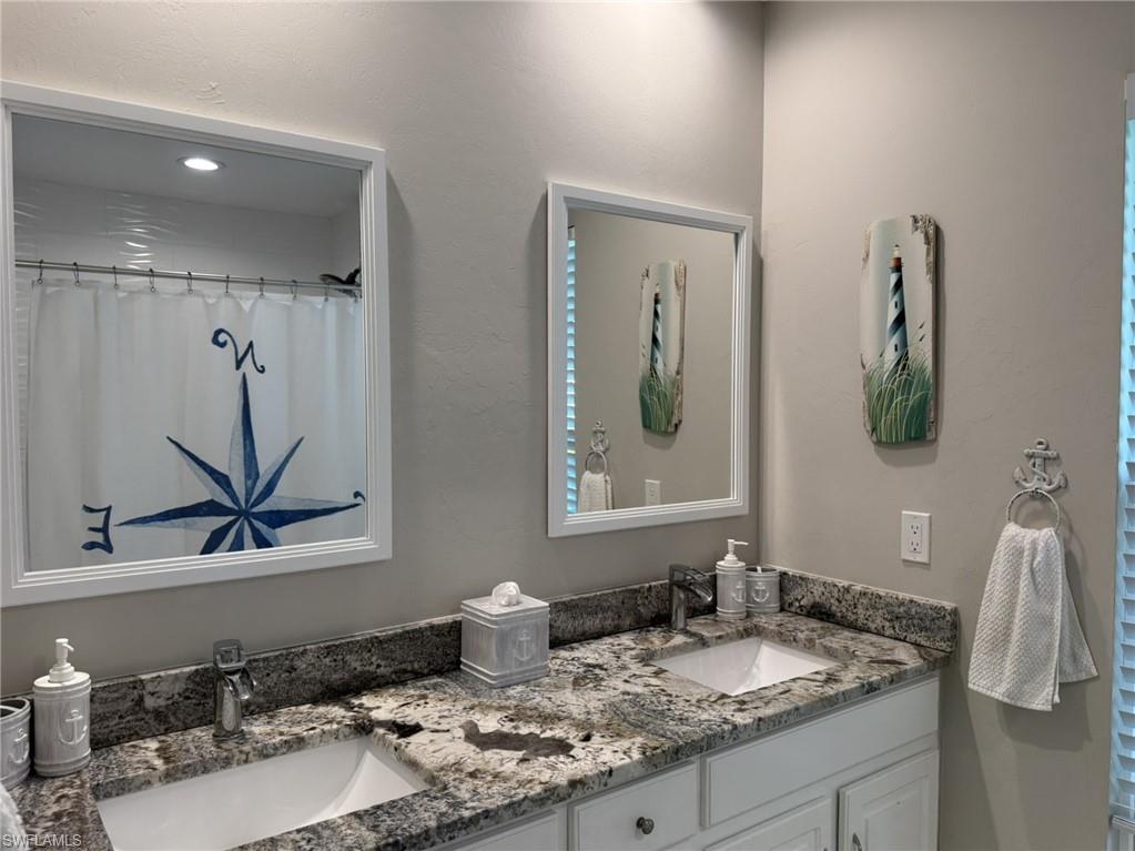 Main Bathroom Dual Sinks, Shower, Water Closet