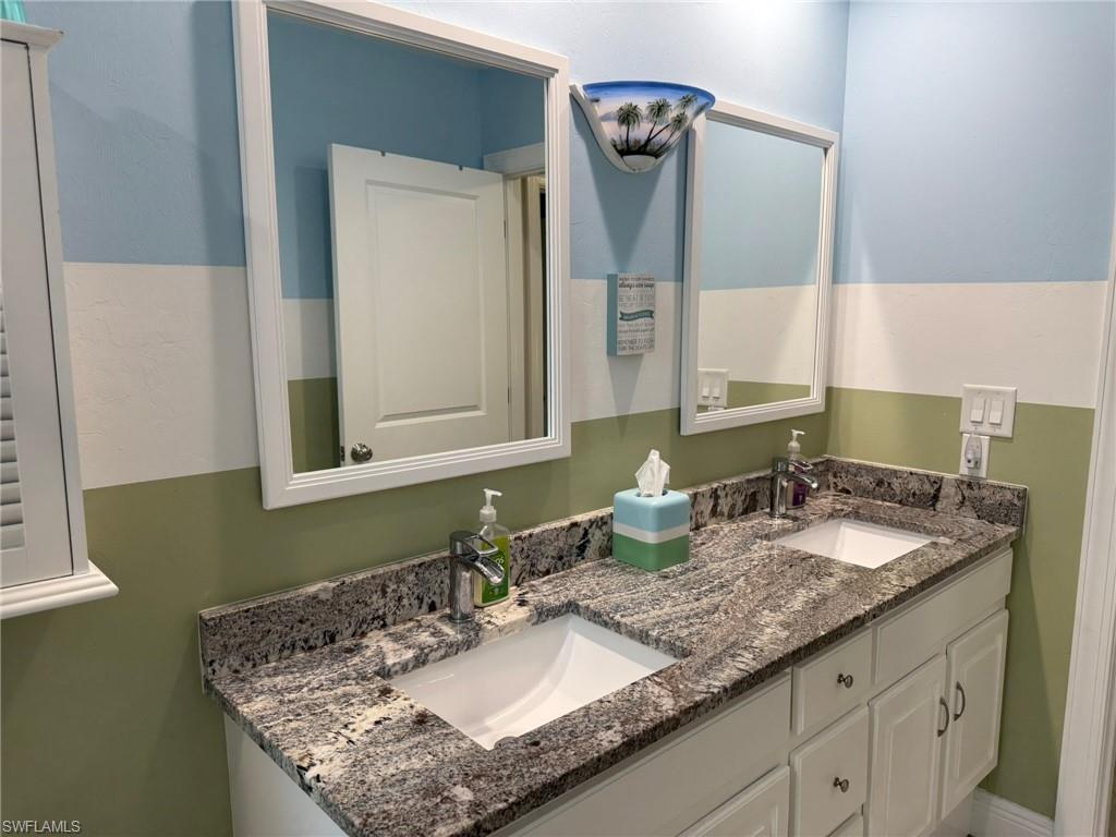 Guest Bathroom with Dual Sinks, Tub Shower Combination