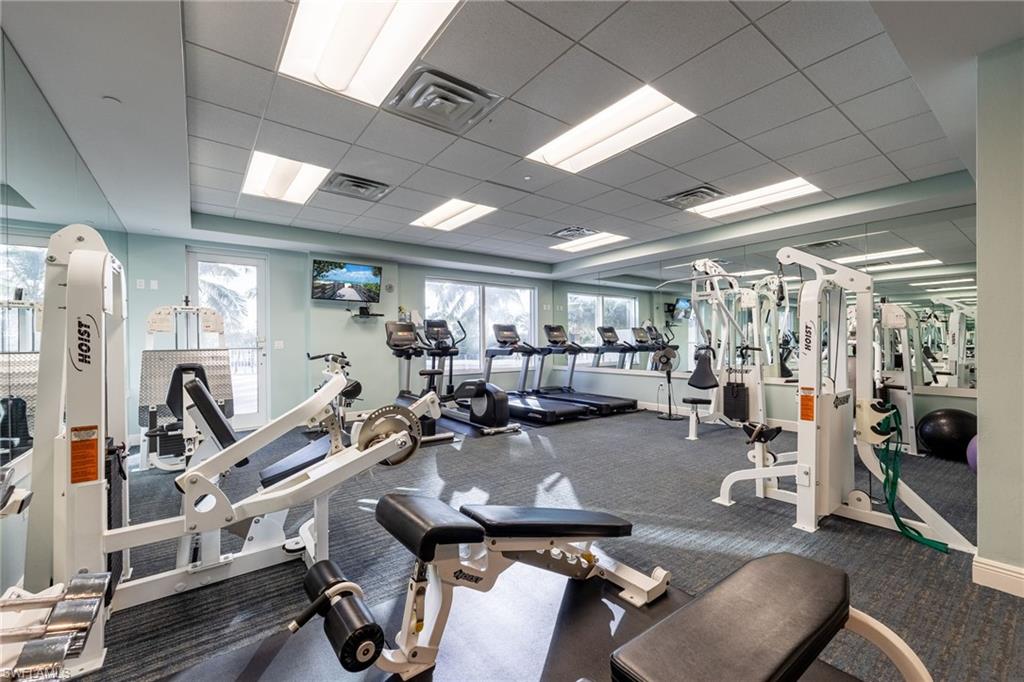 Workout area with a paneled ceiling