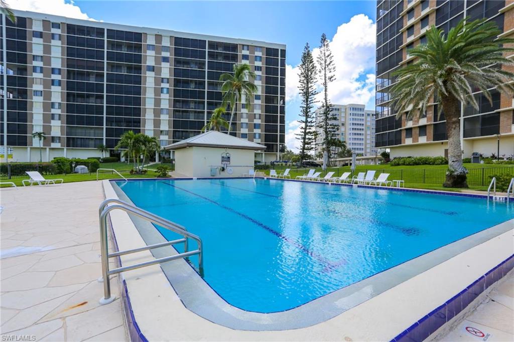 Community pool featuring a patio