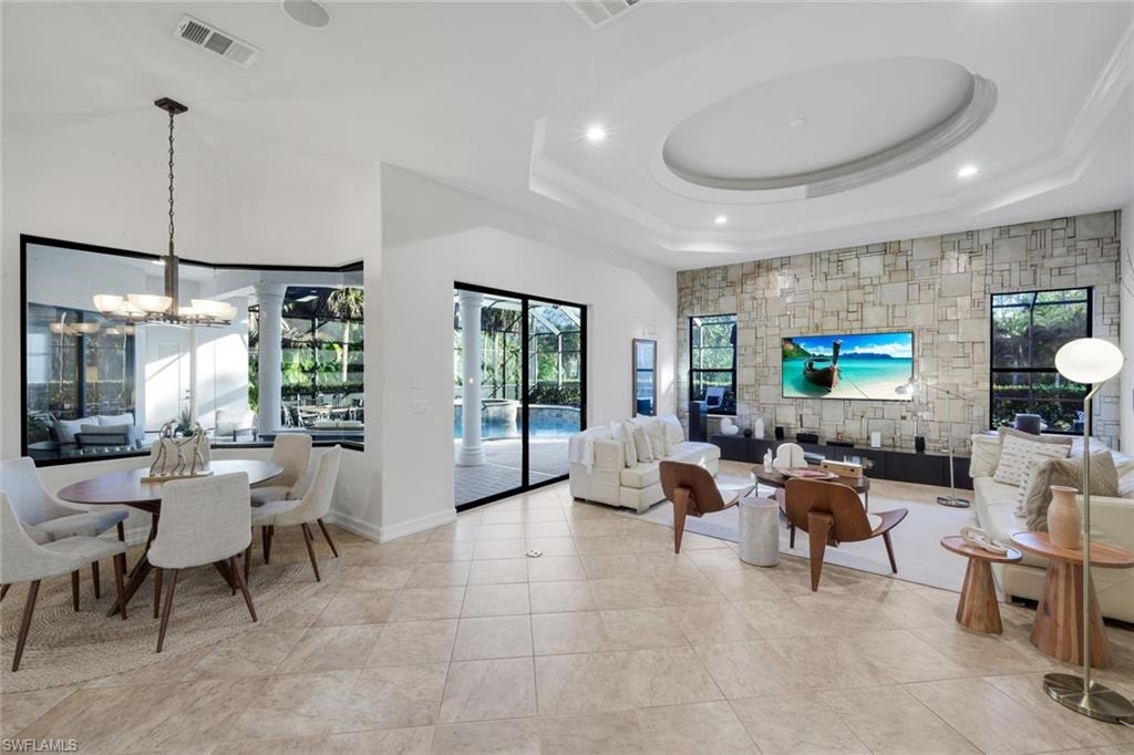 Lobby with recessed lighting and a high ceiling