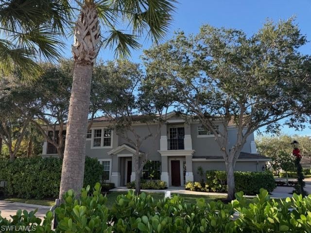 View of front of house with stucco siding