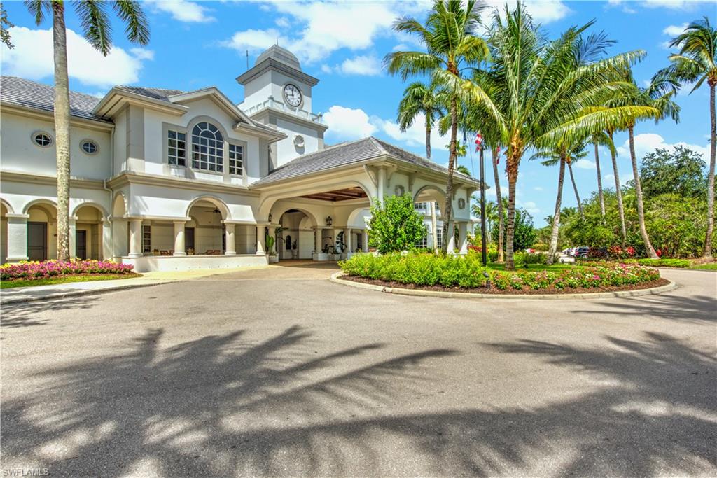View of building exterior with curved driveway