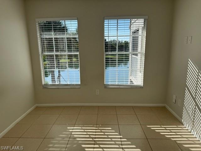 Empty room with baseboards