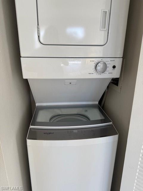 Washroom with stacked washer / dryer