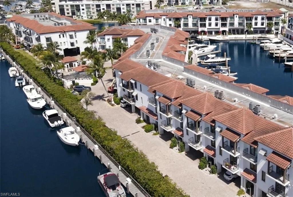 Aerial view Slip C-7 in Curlew Canal at The Naples Bay Resort