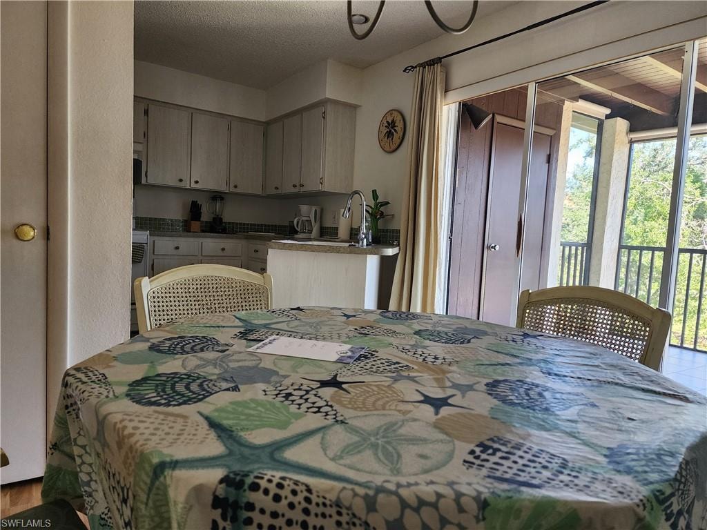 Dining room featuring a textured ceiling