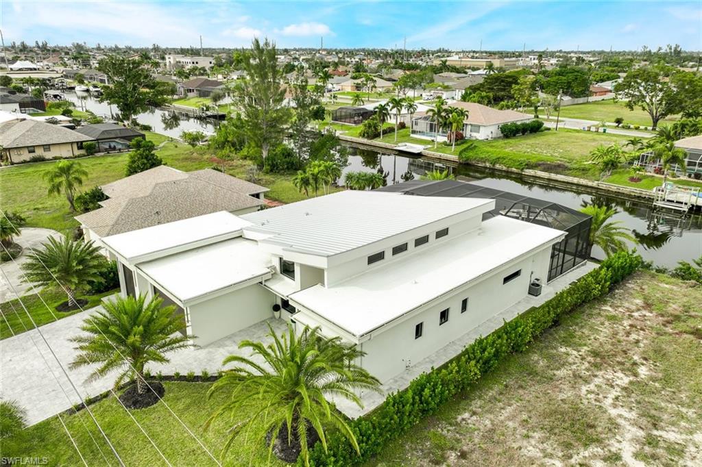 Aerial view of residential area with a nearby body of water