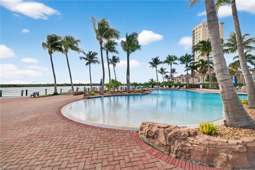 Community pool featuring a patio area