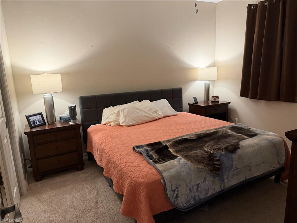 Bedroom featuring carpet